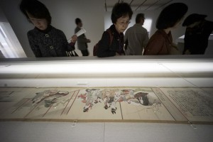 Visitors look at a seven-meter-long "Sumidagawa Ryogan Keshiki Zukan," or Landscape Scroll of Scener